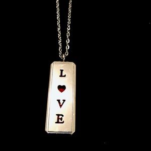 Rectangle Fashionista Love Aromatherapy necklace.